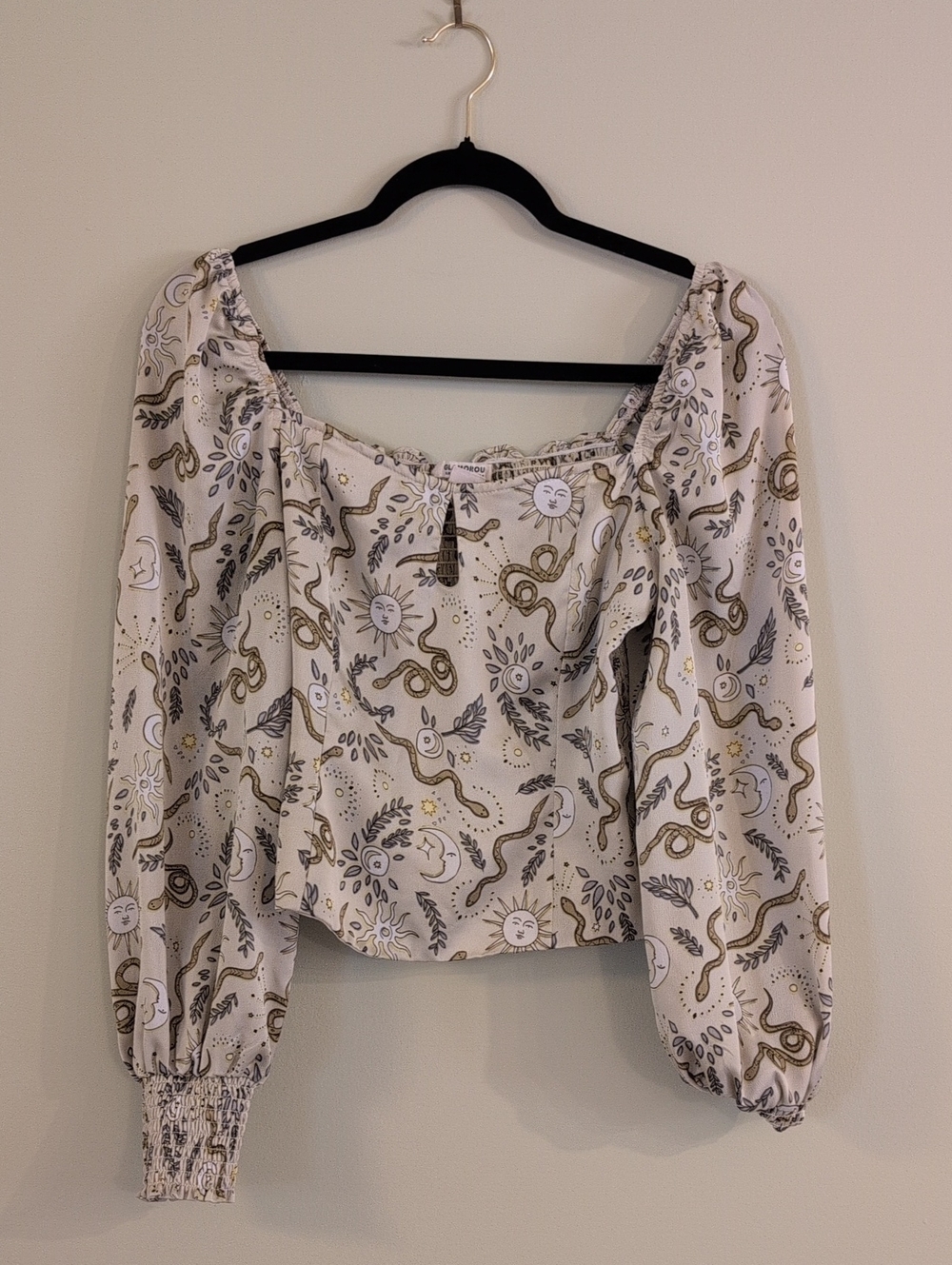 Glamorous Cream Peasant Top with Sun & Snake Print